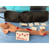 Simulator stop the bleed chile, arm with multiple wounds